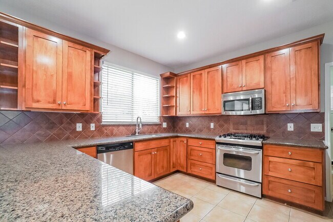 Building Photo - 21902 Willow Shadows Dr