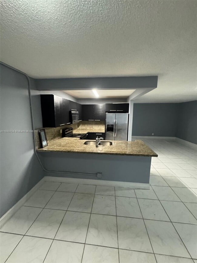 Building Photo - 5955 NW 25th Ct