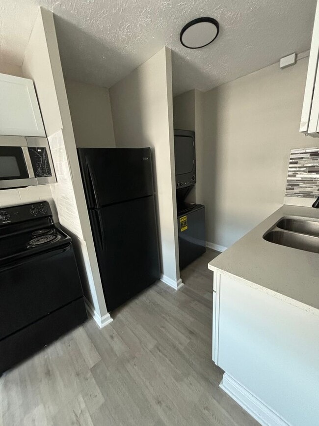 Building Photo - Live in Style without Breaking the Bank at...