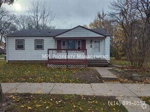Building Photo - 5401 W Sheridan Ave