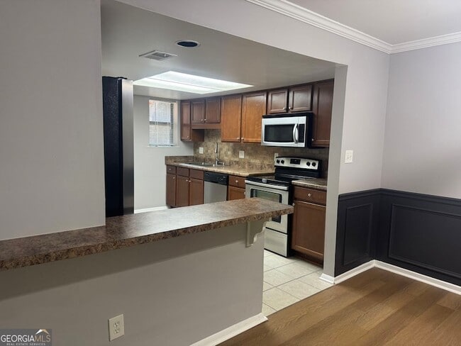 Photo - 2207 Surrey Court SE Unit Apartment