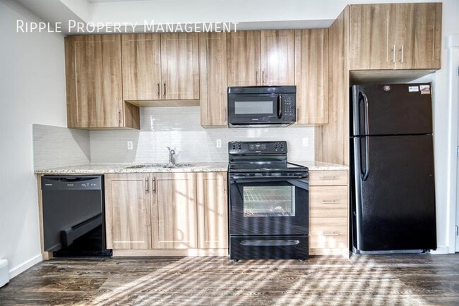 Photo du bâtiment - AMAZING 1 BED/1 BATH CONDO