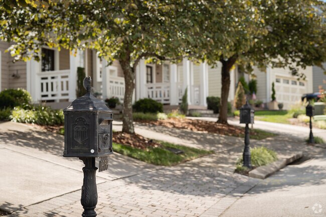Many Red Bank communities offer shaded sidewalks and ornate details.