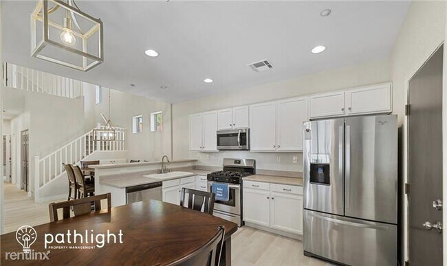 Building Photo - 3 br, 3 bath House - 7877 Wildebeest Court...