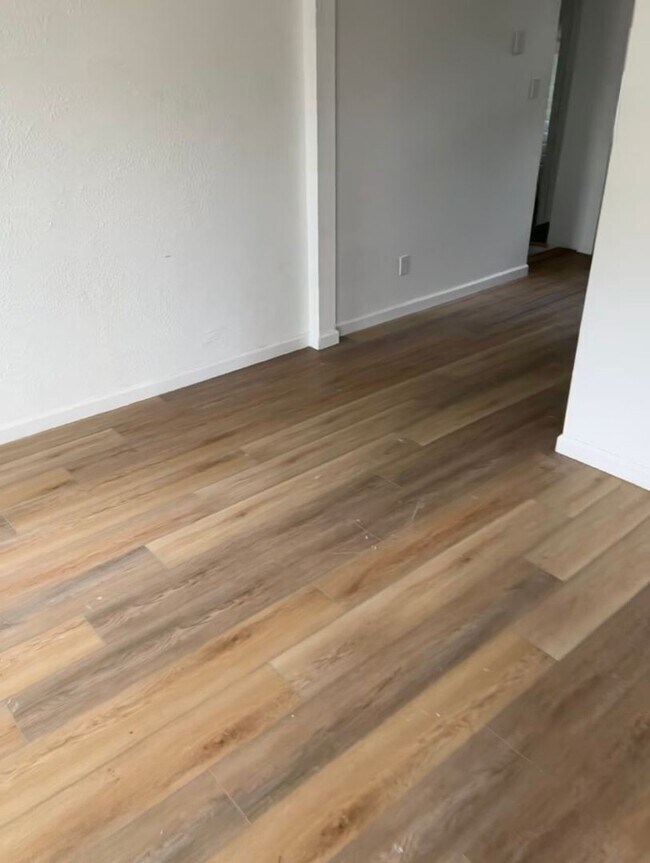 Photo - Black house on a hill