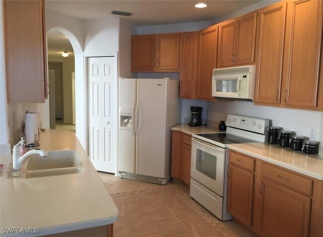 Foto del edificio - 6825 Sterling Greens Dr