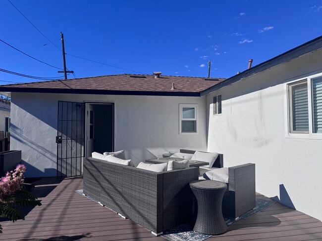 Back Patio with Furniture - 4120 18th Ave