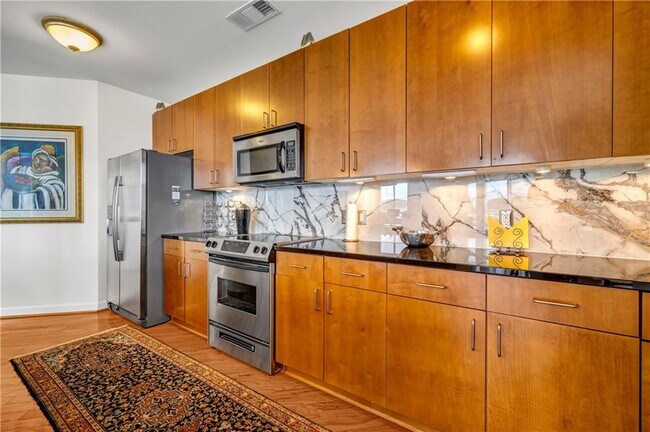 Building Photo - 711 Cosmopolitan Dr NE