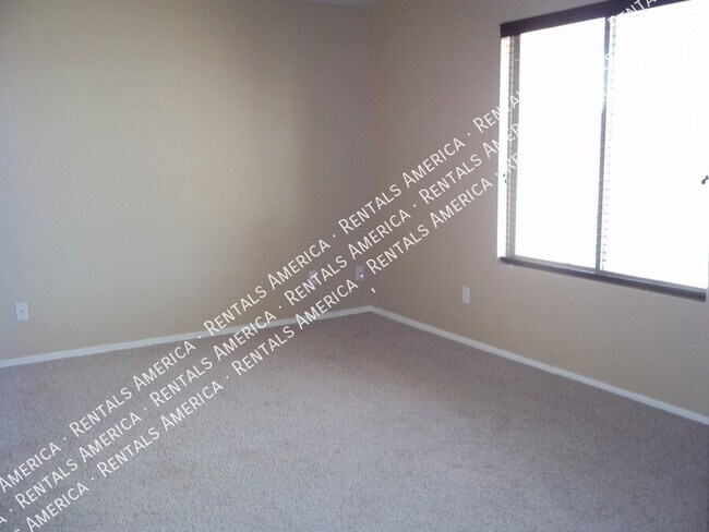 Building Photo - 6605 W Desert Ln