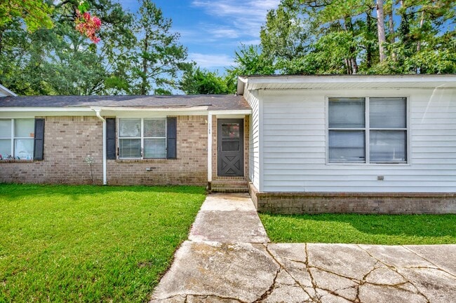 Building Photo - Now Available! Pet-Friendly 2BR Duplex in ...