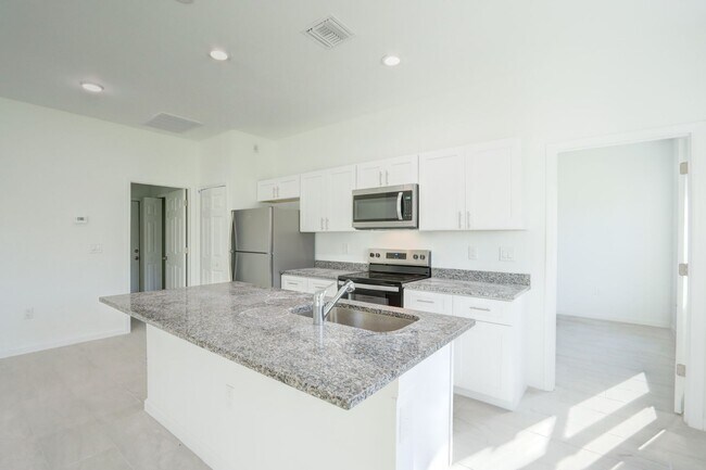 Building Photo - Brand New 3/2/2 + Den-Great location in SW...