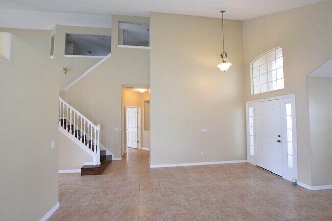 Foto del edificio - AMAZINGLY SPACIOUS 4-Bedroom Home with Loft in Gated Northshore at Lake Hart – Golf, Tennis & Lak...