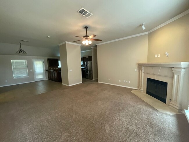 Building Photo - 4 bed, 2 bath, 2 car garage, 12-14 person Storm Shelter