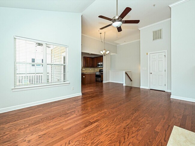 Foto del edificio - Stylish Condo Living with Open Concept, Garage & Outdoor Space