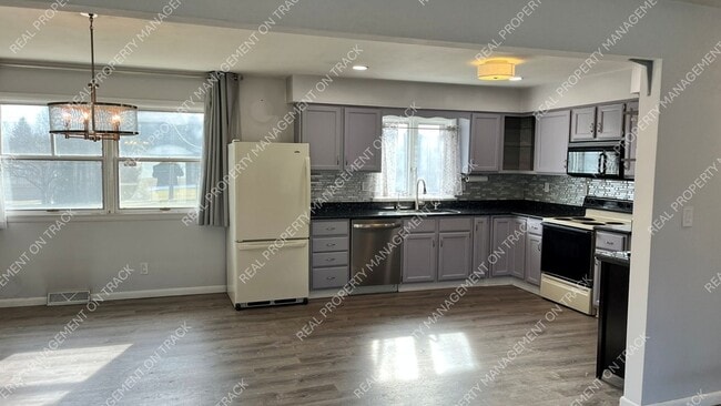 Building Photo - Peaceful 3-Bedroom Home in a Wooded Rockford Neighborhood