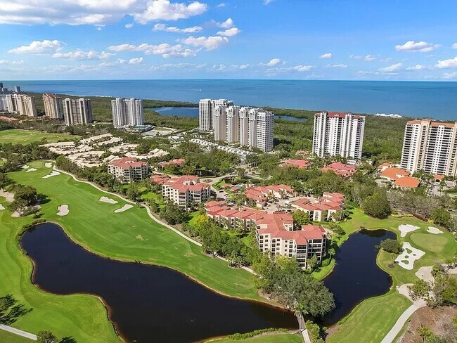 Building Photo - 7032 Pelican Bay Boulevard, Unit 103