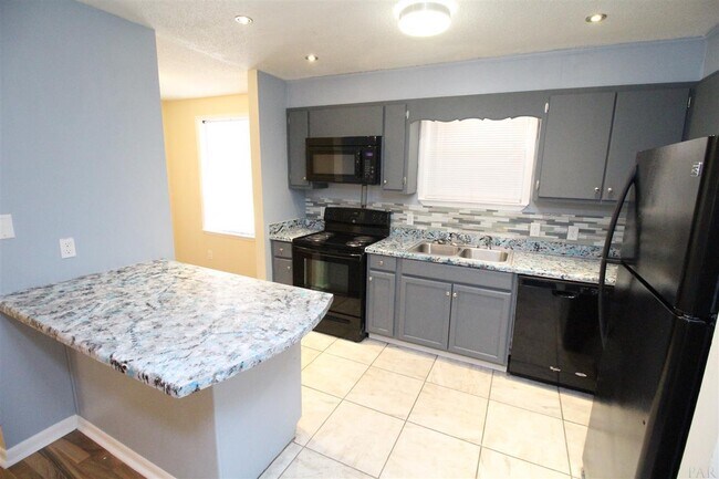 Building Photo - 6565 Kennington Cir