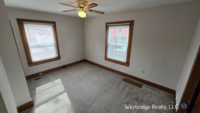 Foto del edificio - Charming 3BR Home in Norwood with Fenced Yard, Detached Garage & Workshop – Prime Location!