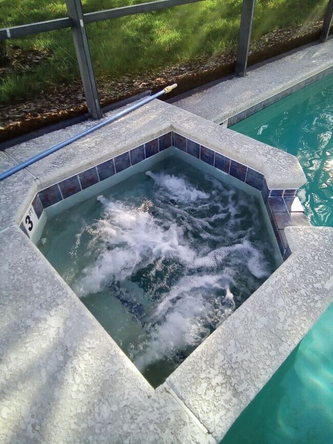 Foto del edificio - Beautiful Pool Home Located in Calabay Par...