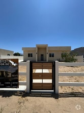Building Photo - 9220 E Ave T 6