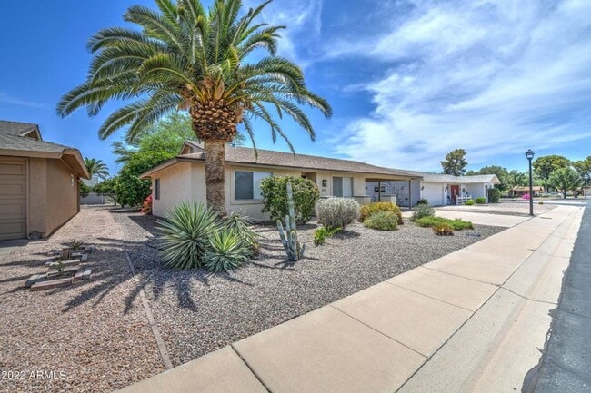 Building Photo - Check out this perfect updated gem, long t...