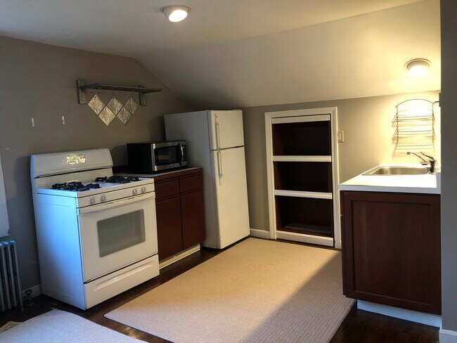 Kitchen on one side with living room on the other side - 126 Clover Hill St