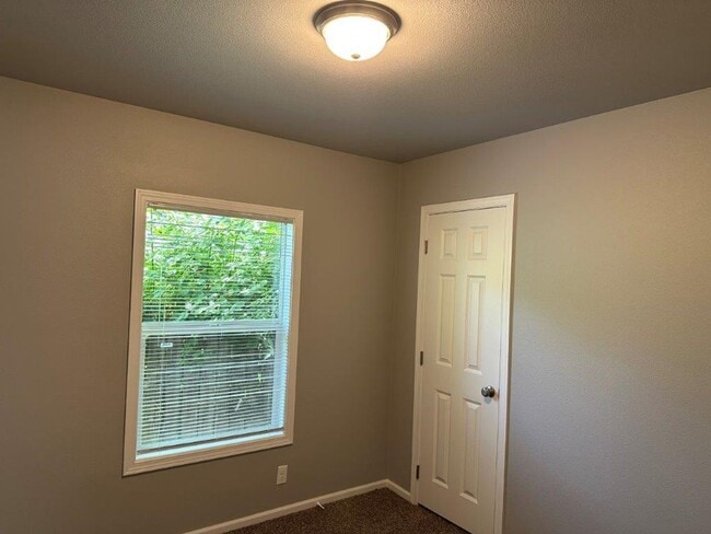 Building Photo - UPDATED single family home, with large yard!