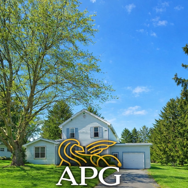 Building Photo - 951 Churchville Riga Rd