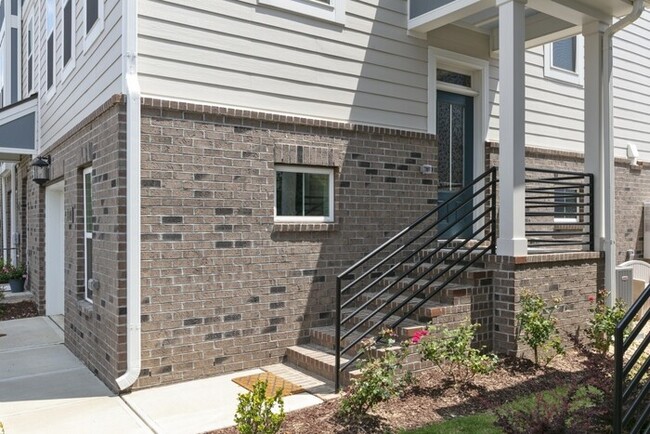 Building Photo - End Unit Townhome | Washer/ Dryer Included...