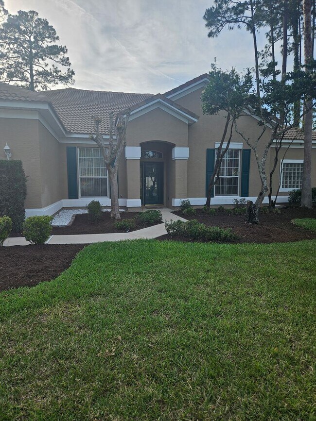 Foto del edificio - 4 BEDROOM 3 FULL BATH HOME WITH A SCREENED IN POOL IN THE BEAUTIFUL PALM COAST
