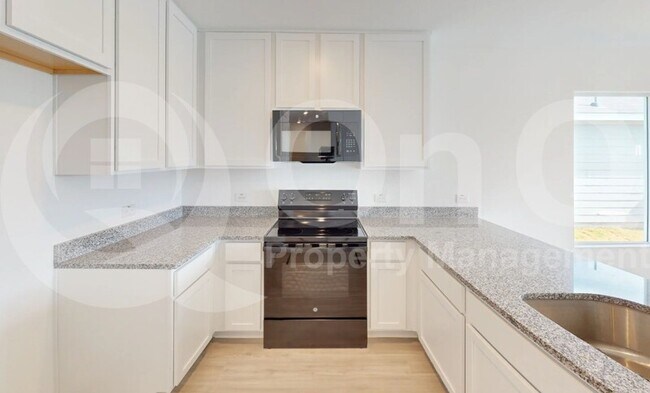 Foto del edificio - 5847 Rock Maple Dr