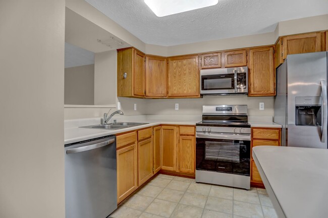 Building Photo - Charming 3-Bedroom Townhome for Rent in Ab...