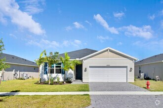 Building Photo - 8990 Dahlia Cir