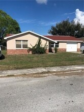 Building Photo - 9831 Lamantin Dr