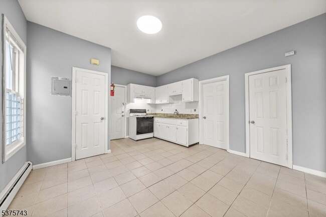 Building Photo - 385 Highland Ave
