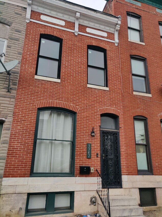 Primary Photo - Spacious 2-Bedroom Townhome with Finished ...