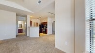 Step into a world of possibility in this exquisite 850 sq ft haven in Corpus Christi. This charming home boasts 2 bedrooms and 2 bathrooms, offering the perfect balance of space and intimacy. The heart of the home is a stunning open-concept kitchen and living area, where rich wood cabinetry meets sleek black appliances, creating a sophisticated culinary space that flows seamlessly into the inviting living room.

Imagine waking up in the spacious 160 sq ft primary bedroom, where vaulted ceilings and an abundance of natural light from multiple windows create a serene retreat. The second bedroom, equally inviting, offers versatility as a guest room or home office. Both bathrooms exude elegance with their warm wood vanities and ample counter space.

Throughout the home, plush carpeting in neutral tones provides comfort underfoot, while the kitchen's gleaming hardwood floors add a touch of luxury. The laundry room ensures convenience in your daily routine, and clever storage solutions, including built-in closets, maximize every inch of space.

This single-story gem at 2133 Nodding Pines Dr is more than just a house; it's an opportunity to embrace the coveted Corpus Christi lifestyle. With its thoughtful design and prime location, this home is ready to be the canvas for your dreams. Don't miss your chance to turn this house into your personal oasis – where every day feels like a vacation in your very own slice of Texas paradise.