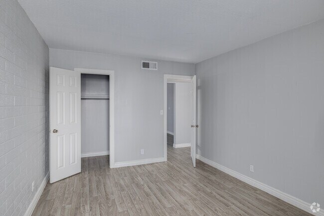 2BR, 1BA - 840SF - Primary Bedroom - Radius Apartments