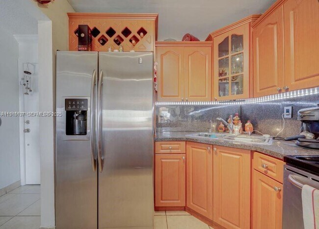 Building Photo - 6950 W 6th Ave