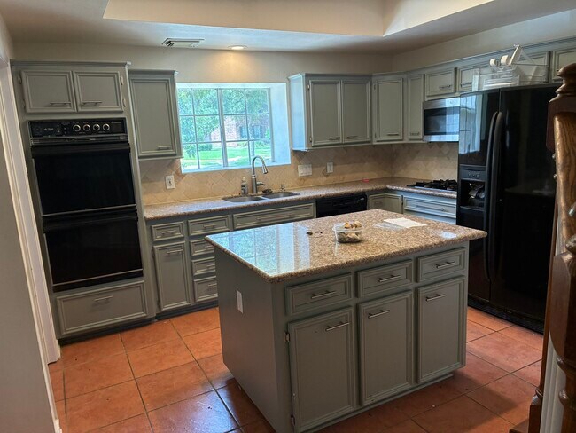 Foto del edificio - 4635 Meadow Green Dr