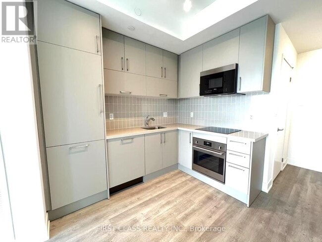 Building Photo - 38-1438 Andre de Grasse St