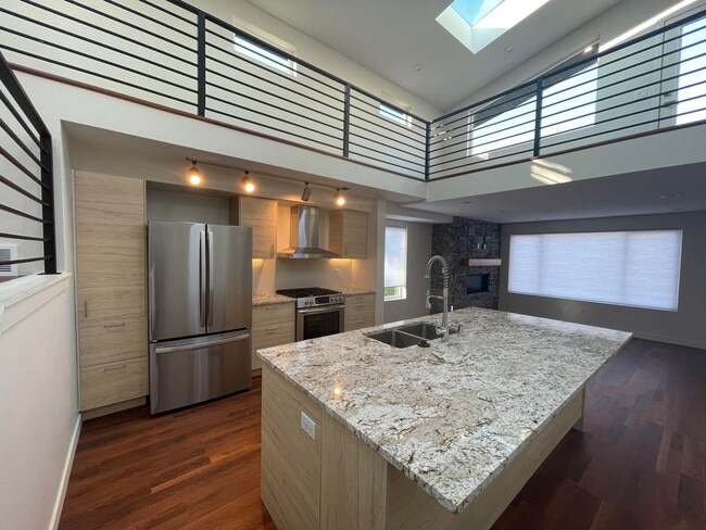Building Photo - Welcome to this stylish and modern 2-bedro...