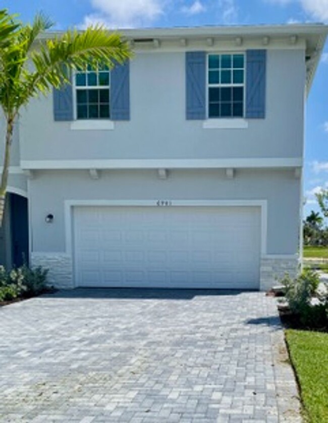 Building Photo - Brand New Townhome Lake Worth - Lakeshore ...