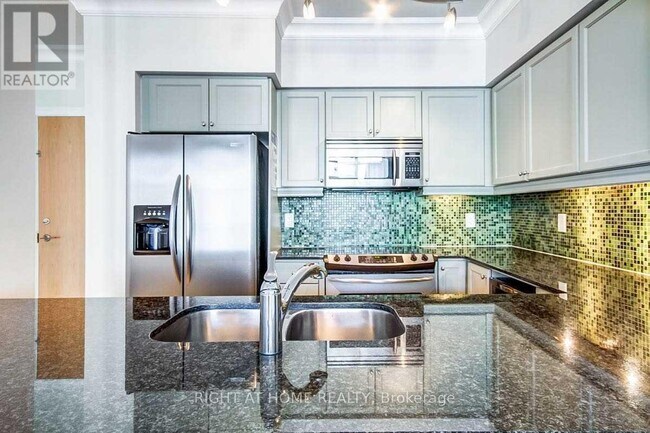 Photo du bâtiment - 58 Marine Parade Dr