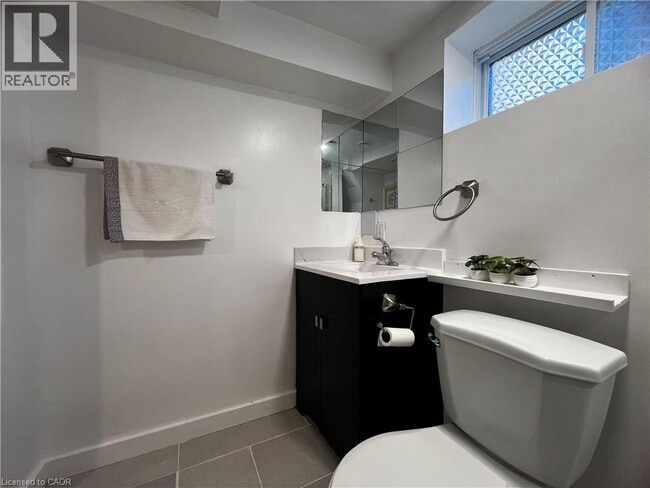 Building Photo - 4424 SIXTH Avenue Unit# BSMT