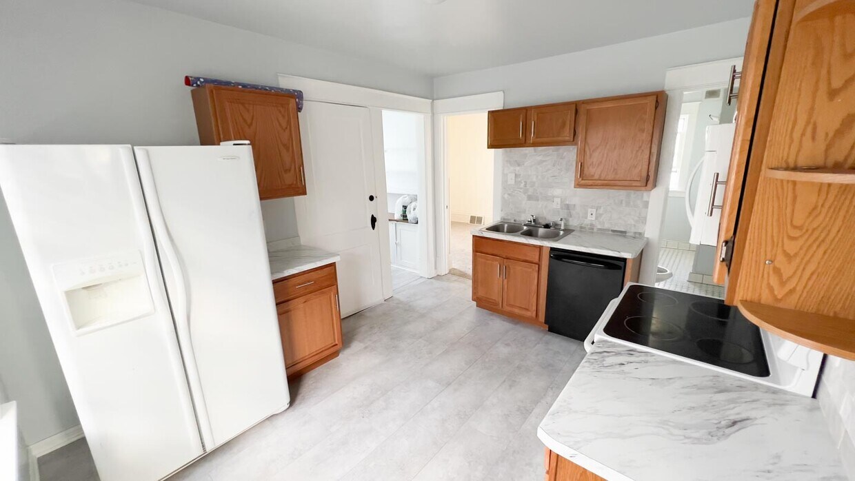 Kitchen with dishwasher & new stainless steel french door fridge (not in picture) - 1559 S 75th St