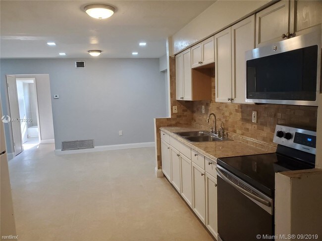Building Photo - 3 br, 2 bath House - 5820 NW 14th Ct