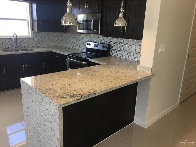 Building Photo - 1703 W Garrison Dr