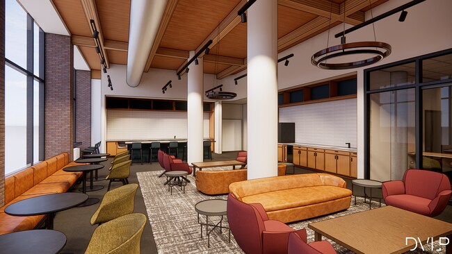 Moderno salón común con elegantes asientos de cuero, elegantes sillas decorativas y grandes ventanales que ofrecen luz natural. - Bogen Lofts Apartments