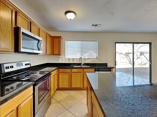 Building Photo - 8850 E Posada Ave